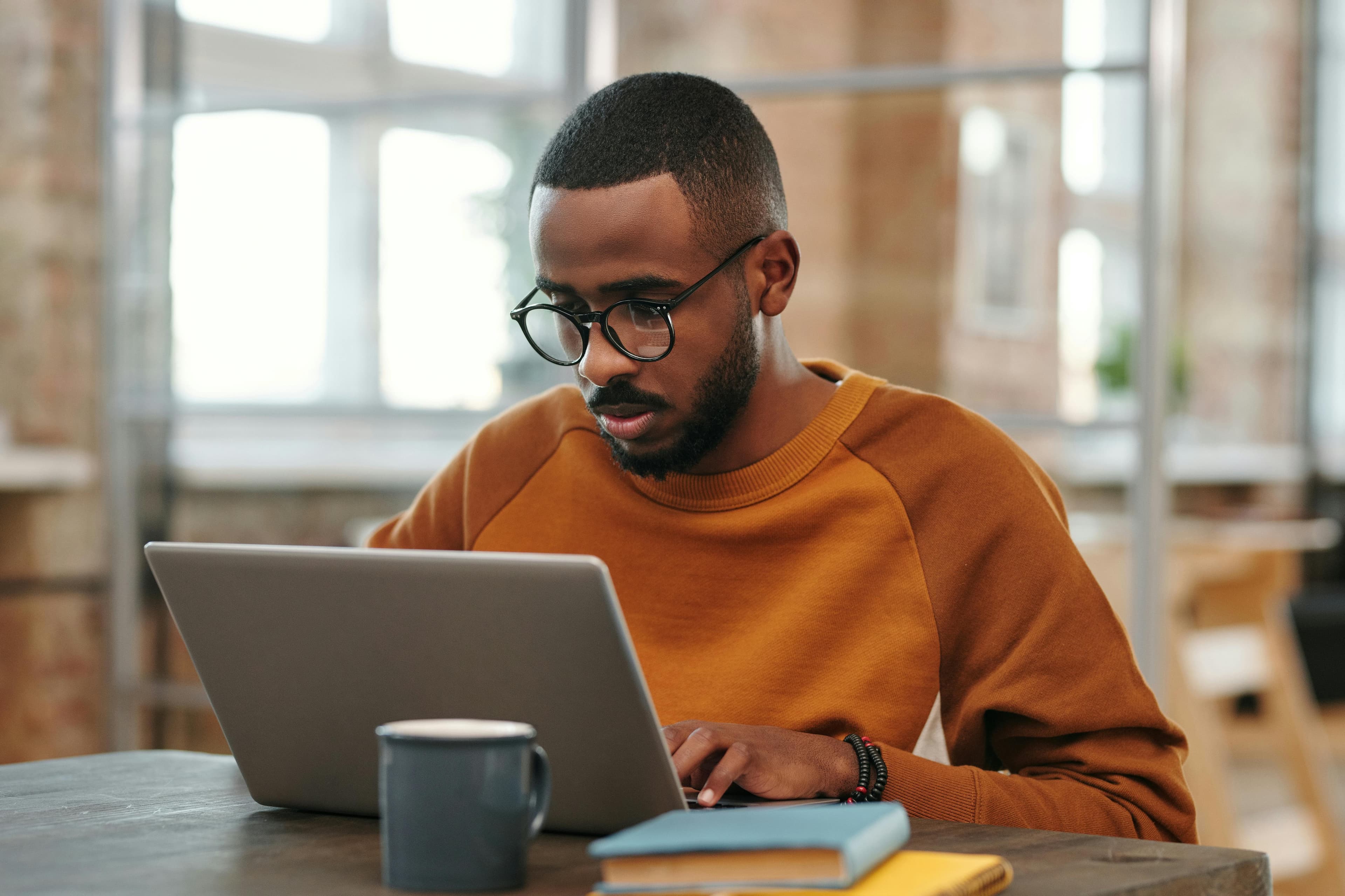 Person studying with laptop